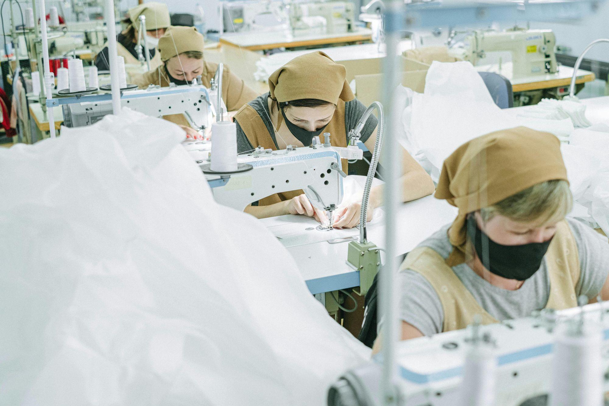 Seamstresses sewing garments