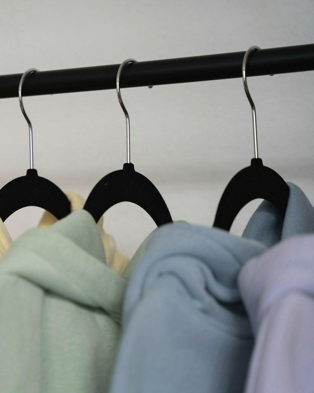 Pastel hoodies on hangers